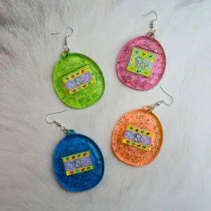 Tama tamagotchis tamagotchi virtual pet animal vr Y2K glitter transparent tech techno kidcore toy toys neon kiddy plastic visco Earring earrings jewellery rave raver raving house party disco clubbing ibiza festival wear neon y2k clubwear hand made handmade cybertwee neon clubkid club kid carnival streetstyle harajuku street style cyber kinderwhore funky groovy techno basement underground urban kidcore kid core clubkid club kid klub goblin goblincore kitsch party kei