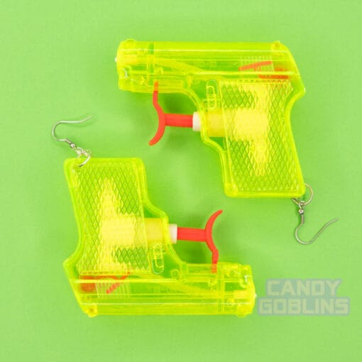 A yellow pair of water pistol earrings