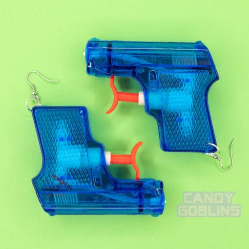 A blue pair of water pistol earrings