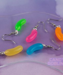 Jellybean earrings in a mix of bright colours! Includes Green, pink, blue, and orange. They're against a purple cloudy background and a logo in the bottom right says Candy Goblins