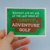Meme memes Bigfoot ate my ass at the last hole at Treetop Adventure Golf cardiff wales welsh Manchester Leicester Birmingham UK United Kingdom cryptid Vinyl sticker stickers slap slaps square y2k laptop sticker laptop decal decals waterproof large lgbt business queer cardiff wales small biz business eggshell