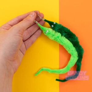 Worm on string earrings toy toys mismatch pair colourful statement lightweight meme novelty handmade UK neon funky quirky earring random colour