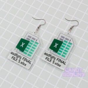 A pair of our Excel Earrings are laid out against a green backdrop. They feature the Microsoft Excel logo, with text underneath that reads 