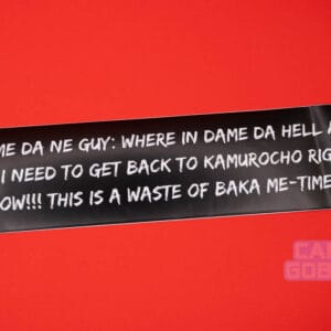 A black bumper sticker shown against a red background. The sticker reads: DAME DA NE GUY: WHERE IN DAME DA HELL AM I?! I NEED TO GET BACK TO KAMUROCHO RIGHT NOW!!! THIS IS A WASTE OF BAKA ME-TIME!!